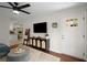 Bright living room with modern decor, hardwood floors, and an open view of the kitchen at 283 Norton Se Cir, Smyrna, GA 30082