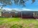 A private backyard featuring a spacious screened in porch at 4246 Chestnut Grove Ln, Austell, GA 30106
