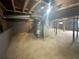 Unfinished basement with concrete floor, exposed ceiling and utilities at 4246 Chestnut Grove Ln, Austell, GA 30106