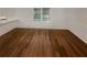 Open dining area boasting wood-look flooring, fresh paint, and natural light at 4246 Chestnut Grove Ln, Austell, GA 30106