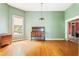 Traditional living room with hardwood floors, neutral walls, and decorative furniture at 668 Peeples Sw St, Atlanta, GA 30310