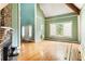 Spacious living room featuring high ceilings, fireplace, and large windows at 668 Peeples Sw St, Atlanta, GA 30310