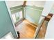 View from the second floor, showcasing the soaring ceilings, large windows, and wooden floors at 668 Peeples Sw St, Atlanta, GA 30310
