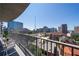 Expansive city views from private balcony featuring contemporary seating and decor at 943 Peachtree Ne St # 1010, Atlanta, GA 30309