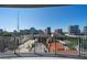Panoramic city view from a private balcony with clear blue sky above the skyline at 943 Peachtree Ne St # 1010, Atlanta, GA 30309