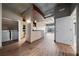 Open living area featuring modern appliances, laundry, hardwood floors, and city views at 943 Peachtree Ne St # 1010, Atlanta, GA 30309
