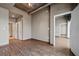 Inviting living space offers wood floors and multiple doorways leading to other areas of the home at 943 Peachtree Ne St # 1010, Atlanta, GA 30309