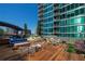 Inviting rooftop lounge featuring plush seating, tables, and planters for a comfortable atmosphere at 943 Peachtree Ne St # 1010, Atlanta, GA 30309