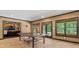 Finished basement with ping pong table, tile flooring and neutral paint at 120 Burford Holw, Alpharetta, GA 30022