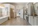 Bright bathroom with a soaking tub and a separate shower at 120 Burford Holw, Alpharetta, GA 30022