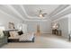 Large main bedroom featuring trey ceilings and natural light at 120 Burford Holw, Alpharetta, GA 30022