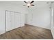 Inviting bedroom featuring hardwood floors and a ceiling fan at 2896 Toney Dr, Decatur, GA 30032