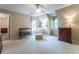 Bedroom with carpet, neutral walls, window nook seating, and matching wooden furniture set at 335 Cameron Ridge Dr, Atlanta, GA 30328