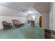 Bonus room featuring a ceiling fan, plenty of furniture, and natural light at 335 Cameron Ridge Dr, Atlanta, GA 30328