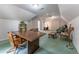Bonus room with a ceiling fan, large wooden desk, and wicker seating at 335 Cameron Ridge Dr, Atlanta, GA 30328