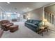 Spacious living room with neutral carpet, stairs to upper level, comfortable seating and great lighting at 335 Cameron Ridge Dr, Atlanta, GA 30328