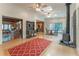 Open living space with hardwood floors, wood-burning stove, and views of other rooms at 335 Cameron Ridge Dr, Atlanta, GA 30328