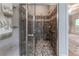 Nicely tiled glass shower with dual shower heads and modern hardware at 335 Cameron Ridge Dr, Atlanta, GA 30328