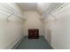 Long walk-in closet with ample wire shelving and a storage unit at 335 Cameron Ridge Dr, Atlanta, GA 30328