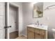 Bathroom featuring a modern vanity, tile floors, and a shower reflected in the mirror at 3890 Cherrydale Se Ln, Smyrna, GA 30082