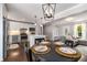 Open concept kitchen with modern appliances and eat in kitchen table near the living room at 3890 Cherrydale Se Ln, Smyrna, GA 30082