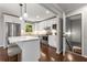 Updated kitchen featuring white cabinets, stainless steel appliances, and a breakfast bar at 3890 Cherrydale Se Ln, Smyrna, GA 30082