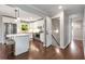 Updated kitchen featuring white cabinets, stainless steel appliances, and a breakfast bar at 3890 Cherrydale Se Ln, Smyrna, GA 30082