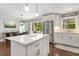 Bright kitchen with white cabinetry, stainless steel appliances, and a large center island at 3890 Cherrydale Se Ln, Smyrna, GA 30082