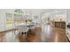 Dining area features hardwood floors, access to kitchen, large windows and view of the front yard at 4503 Woodhaven Ne, Marietta, GA 30067
