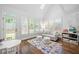 Bright, modern living space with vaulted ceilings, hardwood floors, a play area, and lots of light at 4503 Woodhaven Ne, Marietta, GA 30067