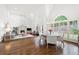 Open living space features fireplace, hardwood floors, lots of natural light and access to the back yard at 4503 Woodhaven Ne, Marietta, GA 30067