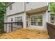 View of a spacious deck with railings and sliding glass doors leading inside at 5560 Pilgrim Point Ext, Cumming, GA 30041