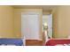 Bedroom with hardwood floors and closet at 5960 Bridge Stone Ct, Cumming, GA 30028