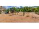 Community playground area with swings, slide, and other play structures at 5960 Bridge Stone Ct, Cumming, GA 30028
