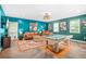 Recreation room with a pool table, seating area, and vibrant blue walls, providing a fun space at 220 Hillswick Ct, Atlanta, GA 30328