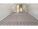 Attic bedroom with carpet flooring and access to bathroom at 30 Trelawney Ct, Covington, GA 30016
