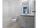 Bathroom features a tub with shower and a white vanity at 30 Trelawney Ct, Covington, GA 30016