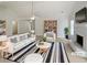 Bright living room featuring neutral walls, fireplace, and stylish furniture at 30 Trelawney Ct, Covington, GA 30016