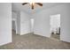 Spacious bedroom with soft carpet, ample closet space, and natural light at 3037 Bonnes Dr, Lithonia, GA 30038