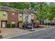 Lovely townhome with manicured landscaping, ample parking, and a desirable neighborhood at 3037 Bonnes Dr, Lithonia, GA 30038