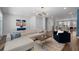 Open-concept living room with seamless flow into the modern kitchen with a large island at 3982 Carver Cir, Doraville, GA 30360