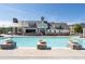 A large swimming pool with fountains and outdoor lounge area, offering a resort-like experience at 3982 Carver Cir, Doraville, GA 30360