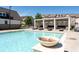 Relaxing community pool area with a nearby outdoor lounge, offering a perfect space to unwind at 3982 Carver Cir, Doraville, GA 30360