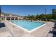 A large pool with a concrete deck and ample seating surrounded by lush landscaping at 3982 Carver Cir, Doraville, GA 30360