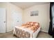 Neutral bedroom featuring carpet flooring, ample natural light, and double door closet at 4306 Laurel Creek Se Ct, Smyrna, GA 30080