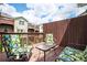 Outdoor deck with seating overlooking the neighborhood and a wood fence at 4306 Laurel Creek Se Ct, Smyrna, GA 30080