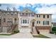 Charming townhome showcasing brick facade, well-maintained landscaping, and convenient garage access at 4306 Laurel Creek Se Ct, Smyrna, GA 30080