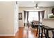 Bright eat-in kitchen with a breakfast bar, stainless steel appliances, and hardwood floors at 4306 Laurel Creek Se Ct, Smyrna, GA 30080