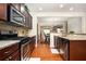 Modern kitchen with granite counters, stainless steel appliances, and hardwood flooring at 4306 Laurel Creek Se Ct, Smyrna, GA 30080