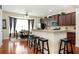 Stylish kitchen with a breakfast bar, stainless steel appliances, and an adjacent dining area at 4306 Laurel Creek Se Ct, Smyrna, GA 30080